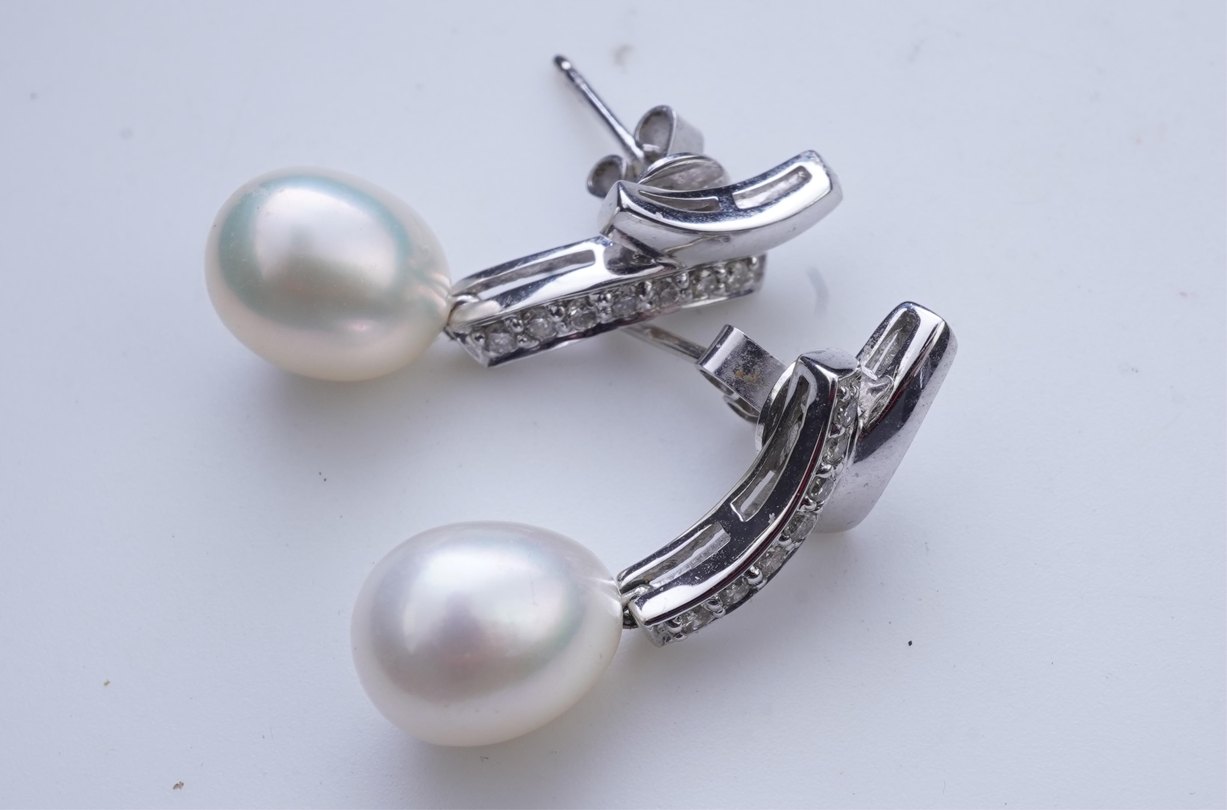 A cultured pearl and diamond demi-parure